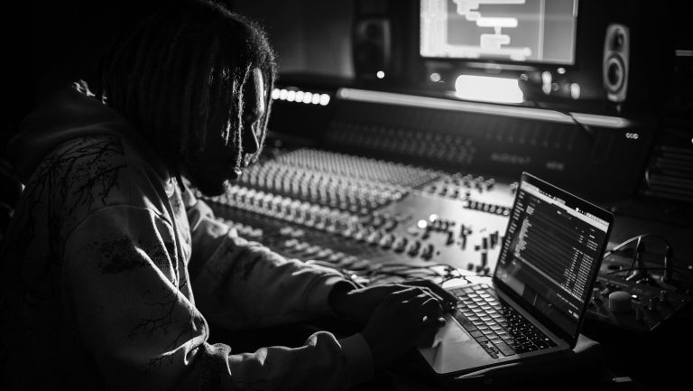 Shaun Chukwuma working in the studio in black and white