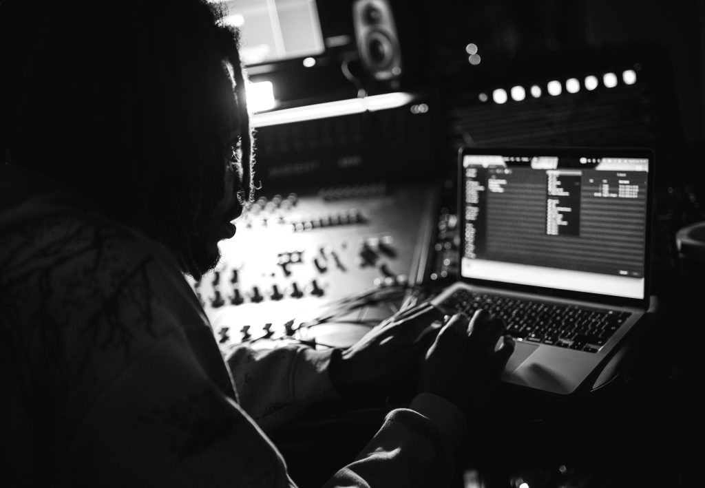 Shaun Chukwuma working in the studio in black and white